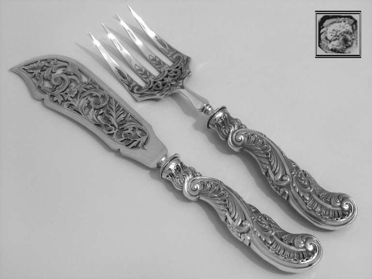 SOUFFLOT Gorgeous French Sterling Silver Fish Servers 2 pc Original box Rococo

Head of Minerve 1 st titre on the handles for guarantee 950/1000 french sterling silver. The upper part of the Fish Servers are silver plated

This set is