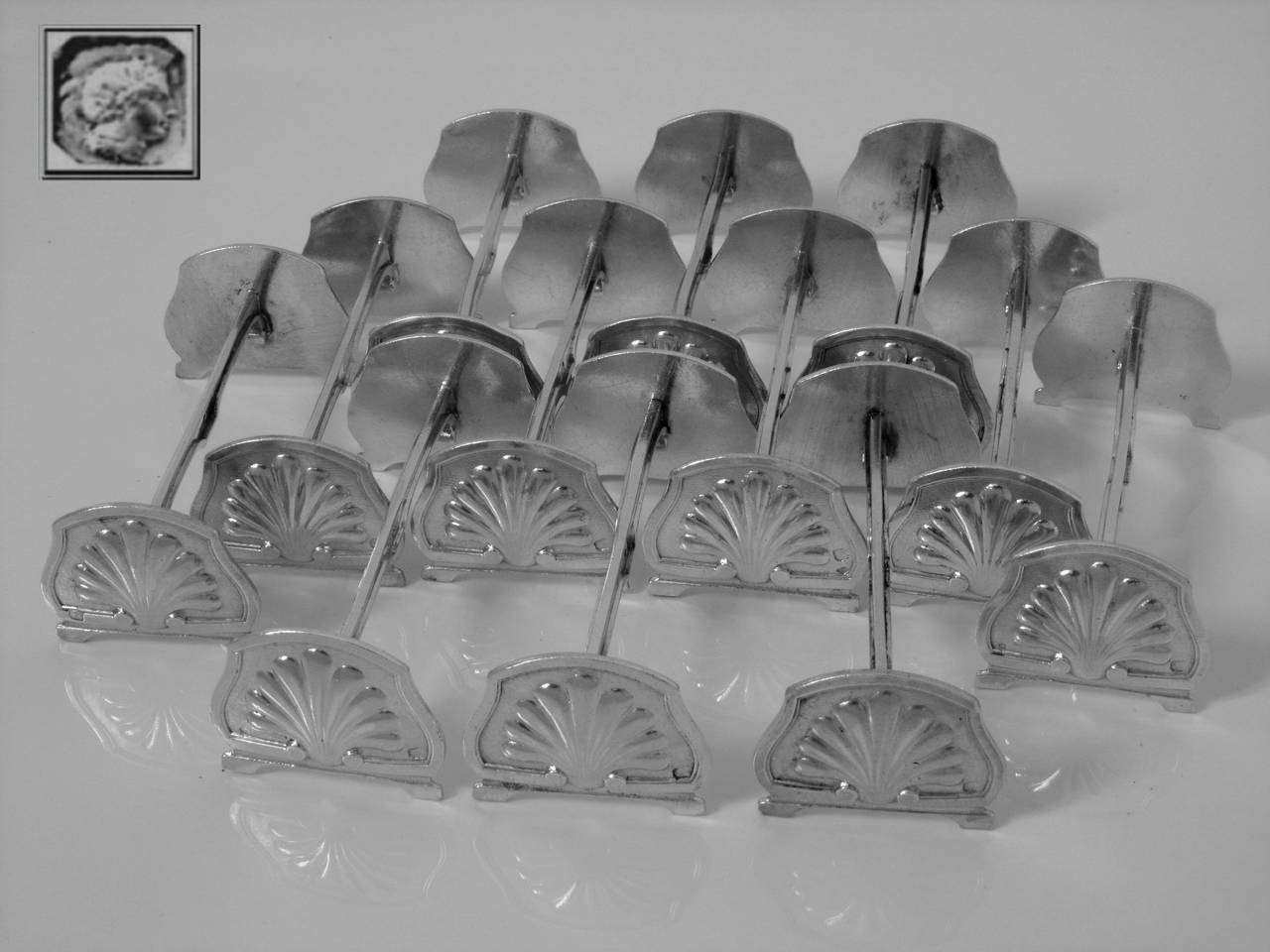 Gorgeous French All Sterling Silver Knife Rests Set 12 pc Shells Model

Extremely rare model of knife rests set. It is even rarer to see full service of 12 pieces of french sterling silver. These objects are usually made of silverplate. Finesse of