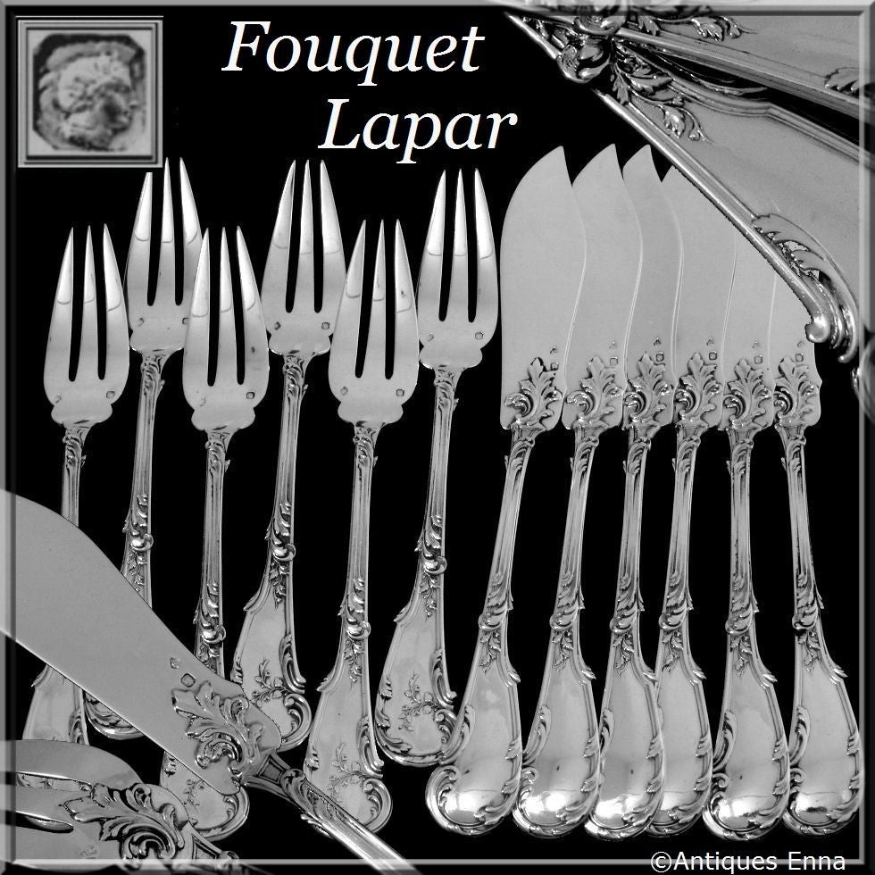 FOUQUET-LAPAR Fabulous French All Sterling Silver Fish Flatware Set 12 pc Rococo

The handles have fantastic decoration in the Rococo style. 

No monogrammed. 

Head of Minerve 1 st titre for 950/1000 French Sterling Silver