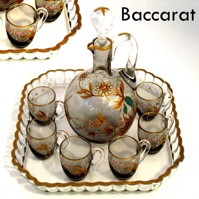 1900's BACCARAT French Enameled Liqueur Set, Decanter, Cordials &Tray Flowers

Exceptional and antique French Baccarat enameled crystal liquor or aperitif service, Circa 1900. Comprising of a decanter, 6 cordial glasses and tray. The amazing