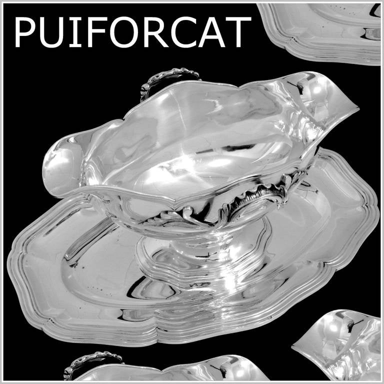 PUIFORCAT Exceptional French All Sterling Silver Gravy/Sauce Boat w/Tray Rococo

Head of Minerve 1 st titre for 950/1000 French Sterling Silver guarantee

Exceptional Rococo Pattern with Foliate handles for this Sauce boat in sterling silver.