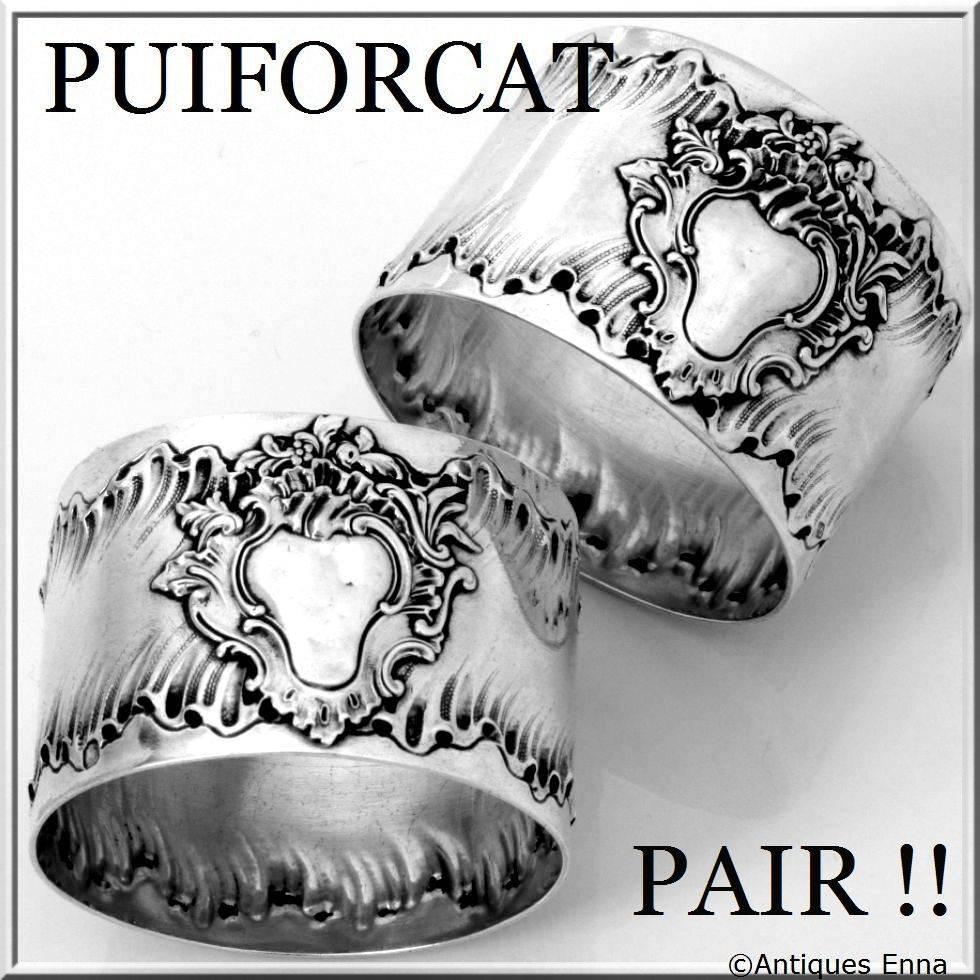 PUIFORCAT Rare French Sterling Silver Napkin Rings Pair Rococo

Head of Minerve 1 st titre for 950/1000 French Sterling Silver guarantee

The Rococo wave pattern/border is scrolling the top and bottom of the each napkin ring, and the front