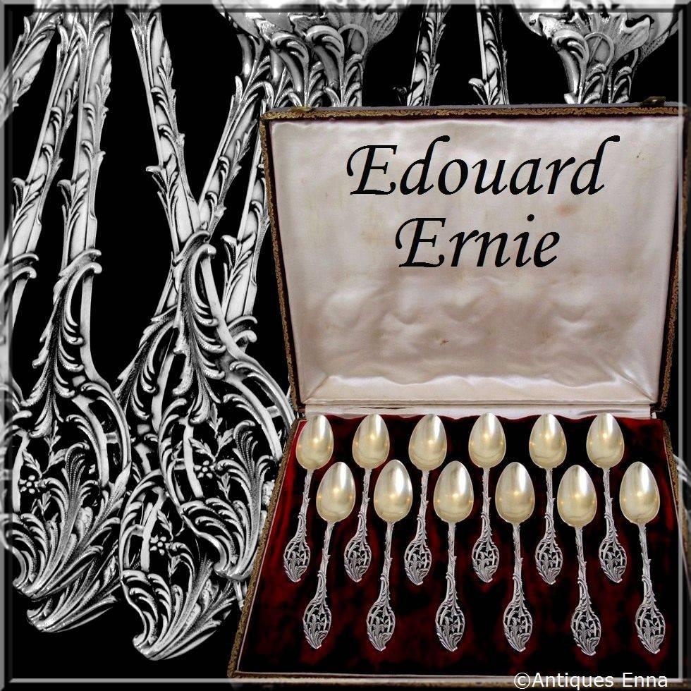 Ernie French Sterling Silver Vermeil Tea Coffee Spoons Set 12 pc w/box Rococo

A set of truly exceptional quality, for the richness of its decoration, its form and sculpting. The interiors of the bowls are silver gilt and the handles are pierced