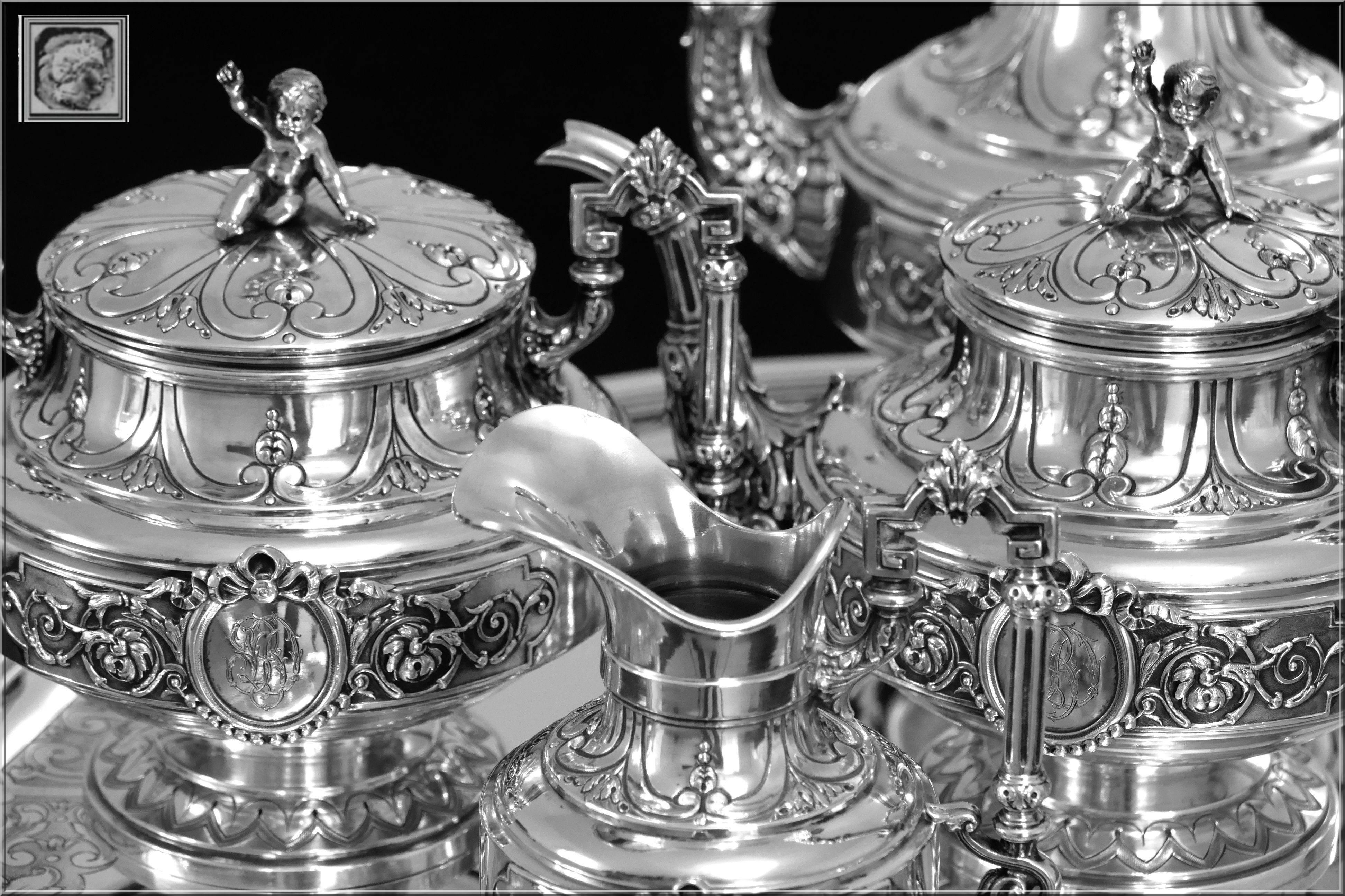Boulenger Fabulous French All Sterling Silver Tea & Coffee Service 5 pc Putti

Head of Minerve 1 st titre for 950/1000 French Sterling Silver guarantee

A rare tea and coffee service 5 pc in all sterling silver with fabulous and exaggerated