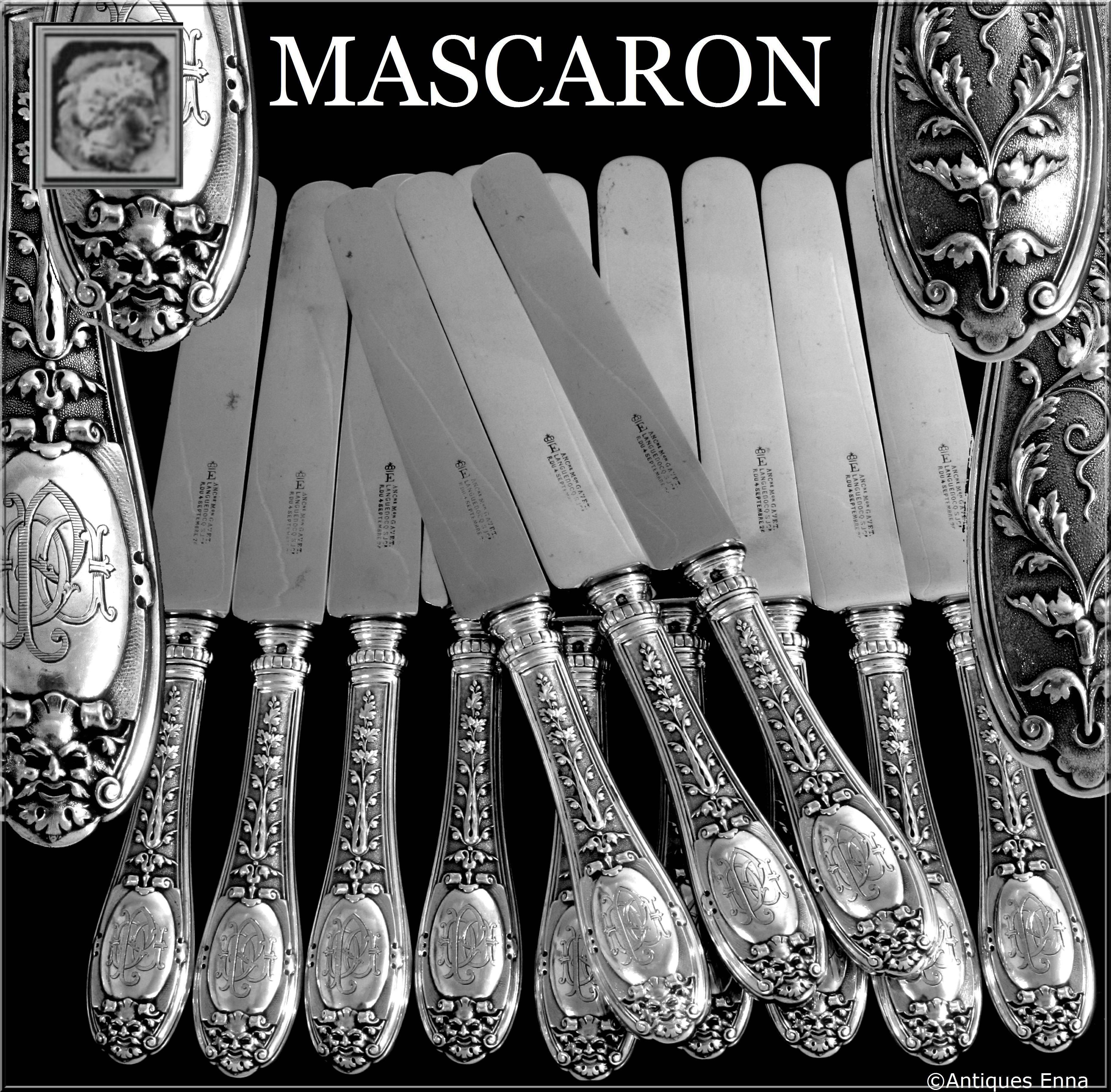 Henin Incredible French Sterling Silver Dinner Knife Set 12 pc Mascaron

Handles have fantastic decoration in the Renaissance style on a stippled backround on one side and decorated with Mascaron & foliages on the other side. Dinner knife set with