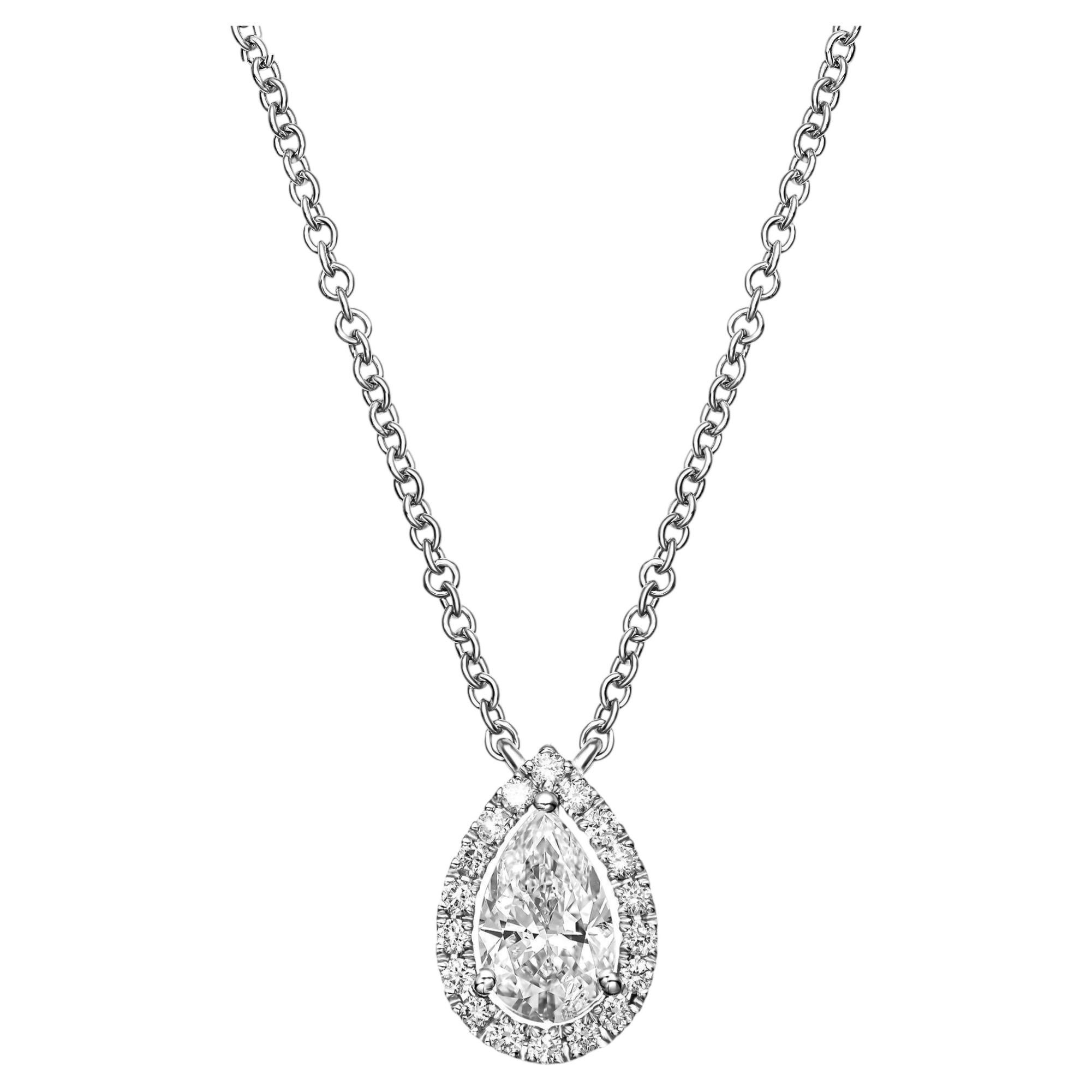 Collier avec pendentif en or blanc 14 carats, orné d'un diamant naturel d'un poids total de 0,71 carat