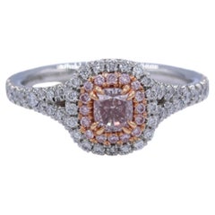 Bague « halo » en platine et or rose 18 carats, sertie d'un diamant rose « Fancy Pink » certifié GIA de 1,00 carat au total