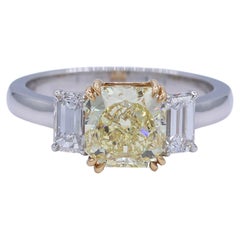 2.68 Carats Total Weight, GIA Fancy Yellow Radiant and Emerald three stone ring
