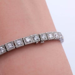 Bracciale tennis vintage in platino con diamanti in stile Art Déco, peso totale 7,50 carati