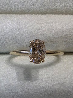 GIA 1.01ct. Oval Champagne Solitare Diamond Ring Set In 14kt. Yellow Gold
