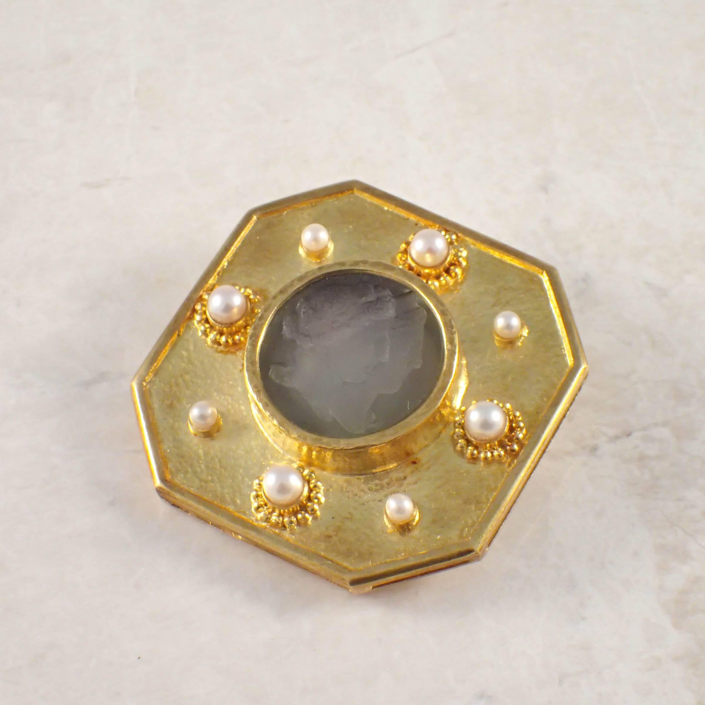 18k yellow gold Elizabeth Locke pearl cameo brooch.  The square brooch, with cut corners measuring 1 3/4x1 3/4 inches, set with one round green glass cameo measuring 22mm, and eight cultured pearls.  Gold weight 31.1 grams
Elizabeth Locke stamp