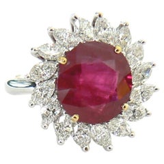 Modernist Ballerina Design Round Burmese Ruby Ring With Marquise Diamonds