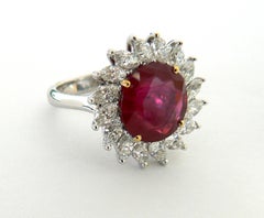Modernist Ballerina Design Round Burmese Ruby Ring With Marquise Diamonds