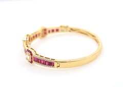 Art Deco Inspired 6.68 Carat Ruby and Diamond Bangle Bracelet in 18K Yellow Gold