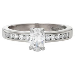 Modern 0.65ct Oval Diamond Engagement Ring in 18K White Gold