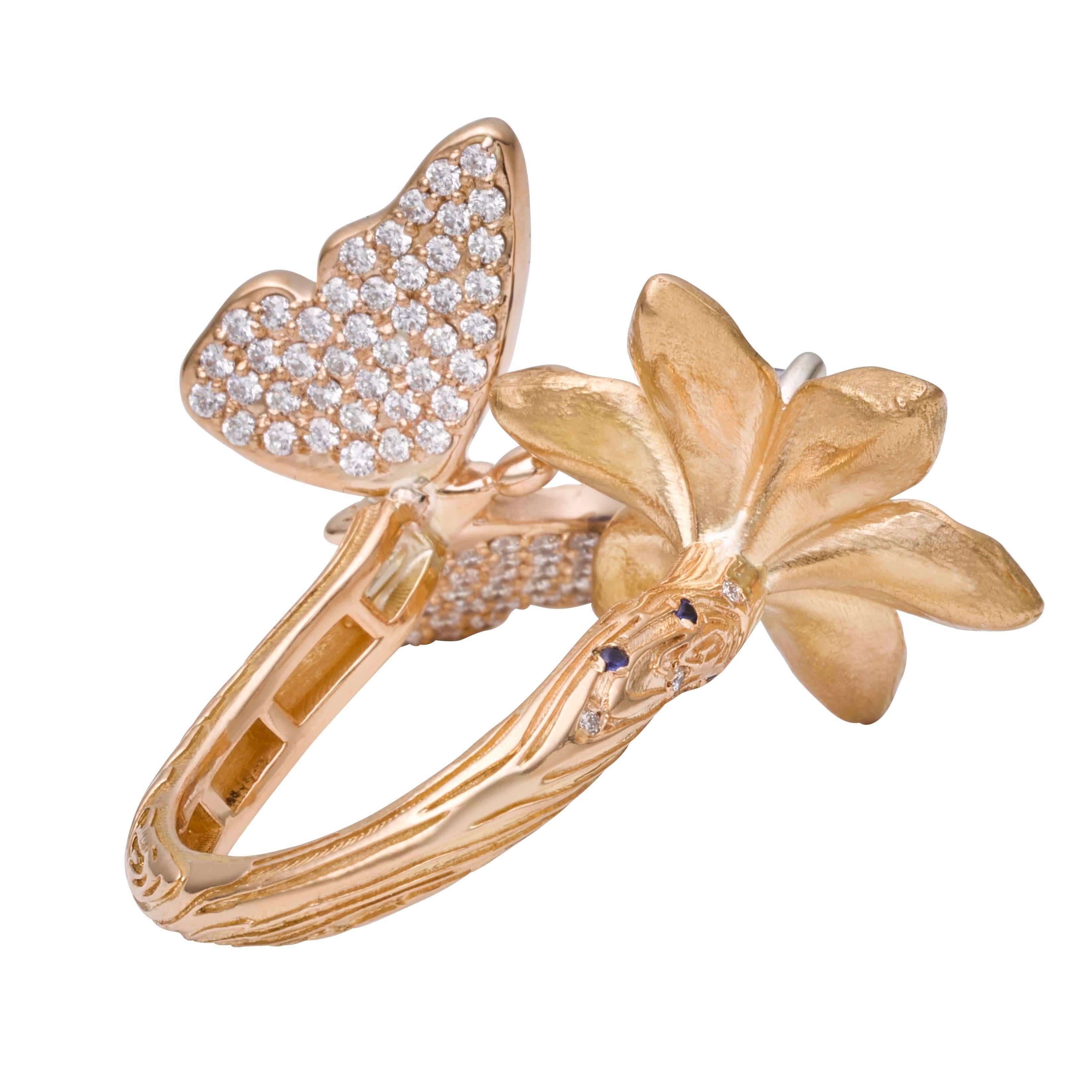 A one of a kind piece, the Petal Butterfly Ring is inspired by the circle of life that exists within nature. The flower is set with a sparkling center stone and accented by white diamonds and sapphires mounted in 20k rose gold.

1.07ct blue