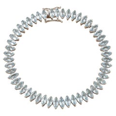 Pulsera tipo «tenis» de aguamarina de 11,10 ct. Pulsera tipo «tenis» de oro de 18 K con piedras en forma de marquesa, de 7,5 pulgadas