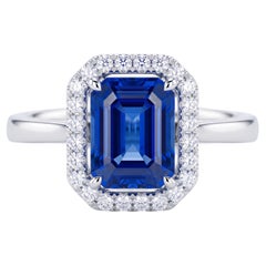 18K White Gold 2.06 Carat Emerald-Cut Blue Sapphire and Diamond Halo Ring