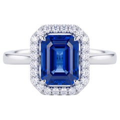 18K White Gold 2.06 Carat Emerald-Cut Blue Sapphire and Diamond Halo Ring
