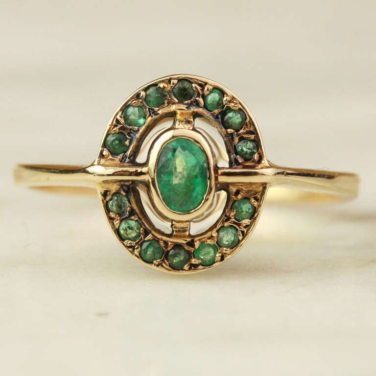 Emerald and Gold Halo Ring