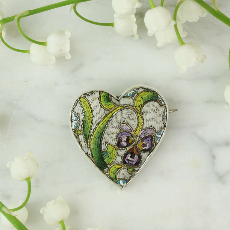 - Antique Micro Mosaic Heart Pin
- c. 1880-1900
- Glass, sterling silver

Examples of micro mosaic this finely executed are extremely hard to find -- wonderfully finished with dazzlingly tiny glass tessarae tiles, this masterful piece offers