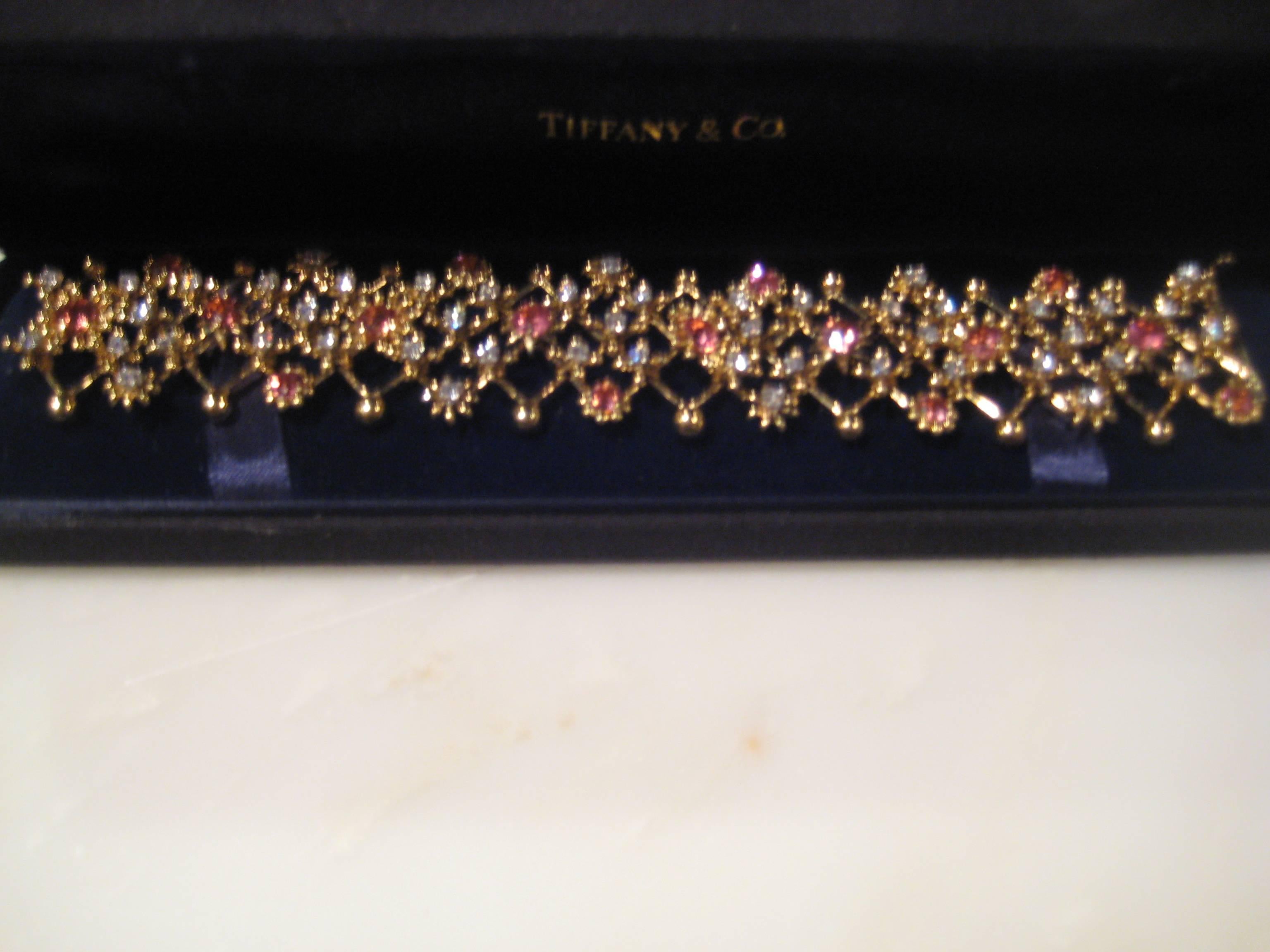 Vintage Tiffany & Co. 18KT Yellow gold diamond and pink sapphire bracelet. Bracelet contains approximately 4.00cts. in diamonds and approximately and approximately 16.00cts. in pink sapphires . Diamonds are F - G in color and VVS - VS in clarity.