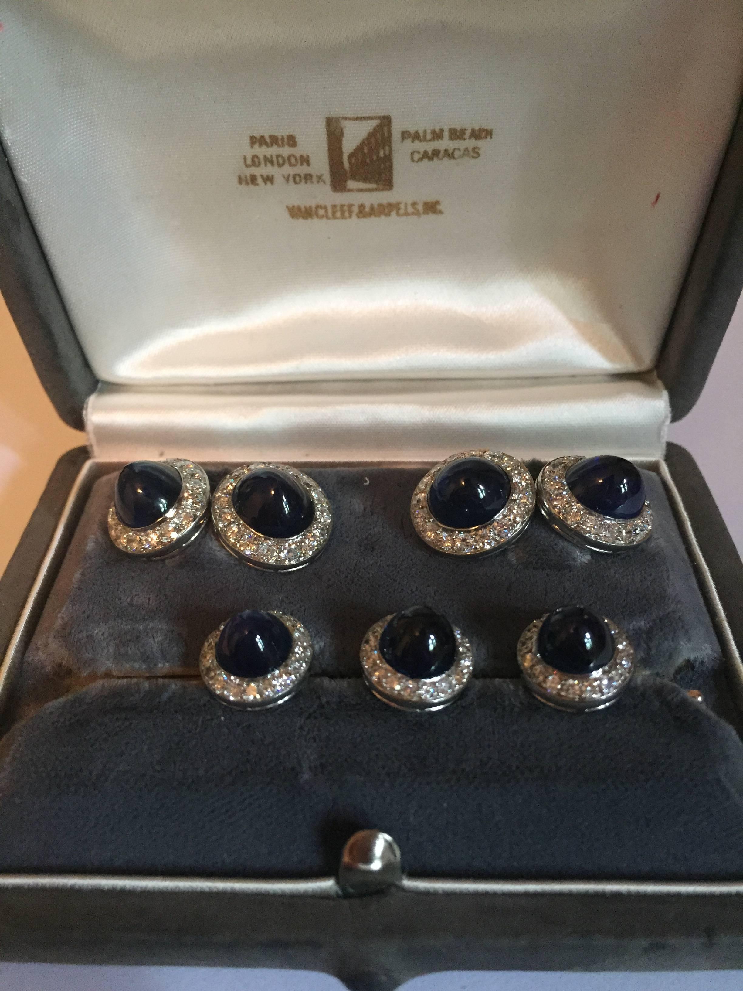 Vintage Van Cleef & Arpels platinum diamond and Burma sapphire cufflinks and stud set. Set contain approximately 35.00cts. in sapphires and approximately 5.00cts. in diamonds. Diamonds are E - F in color and VVS - VS in clarity. The set weighs 20.00