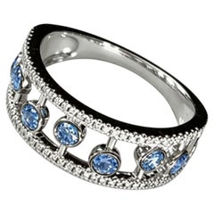 Anello a fascia in oro bianco 14 carati con diamante blu, misura 7, di seconda mano di marca