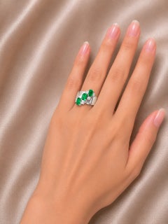 Platinum Emerald Solitaire Diamond Accent Ring