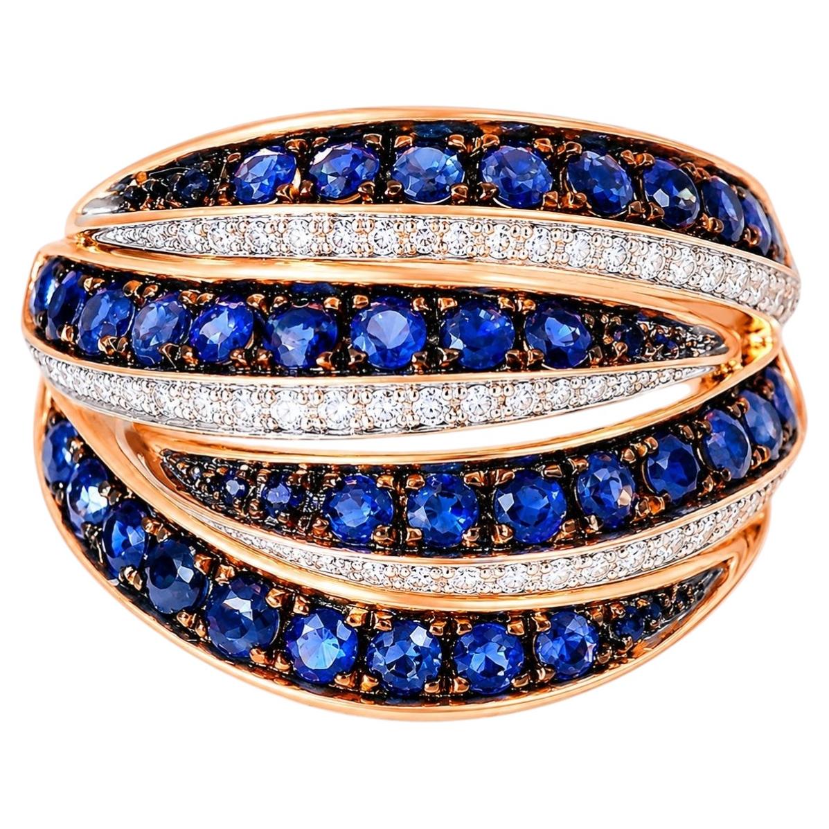Bague en or rose 14 carats sertie de diamants et de saphirs