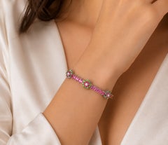Bracelet manchette en or blanc 18 carats, avec saphir rose, grenat vert et diamants