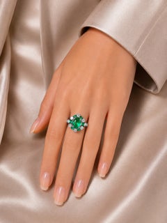 14K White Gold Emerald Diamond Cluster Ring