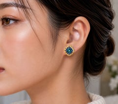 Ohrstecker aus 14-karätigem Gelbgold mit blauem Topas, Saphir und Diamanten – aus einem Nachlass