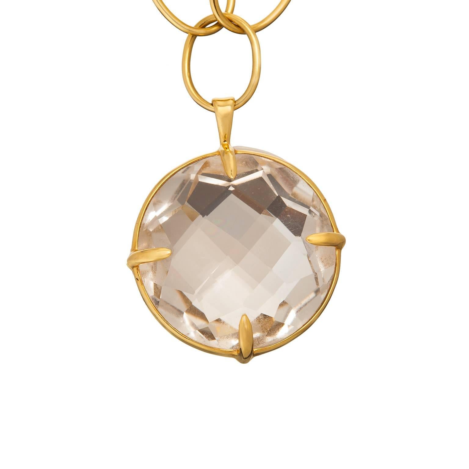 A very easy to wear Ippolita rock crystal quartz pendant necklace with an open link 18k yellow gold chain.  The quartz is round in shape, and faceted on both sides, partially bezel and prong set.  The chain is 20.00 inches.

Quartz Measurement: 