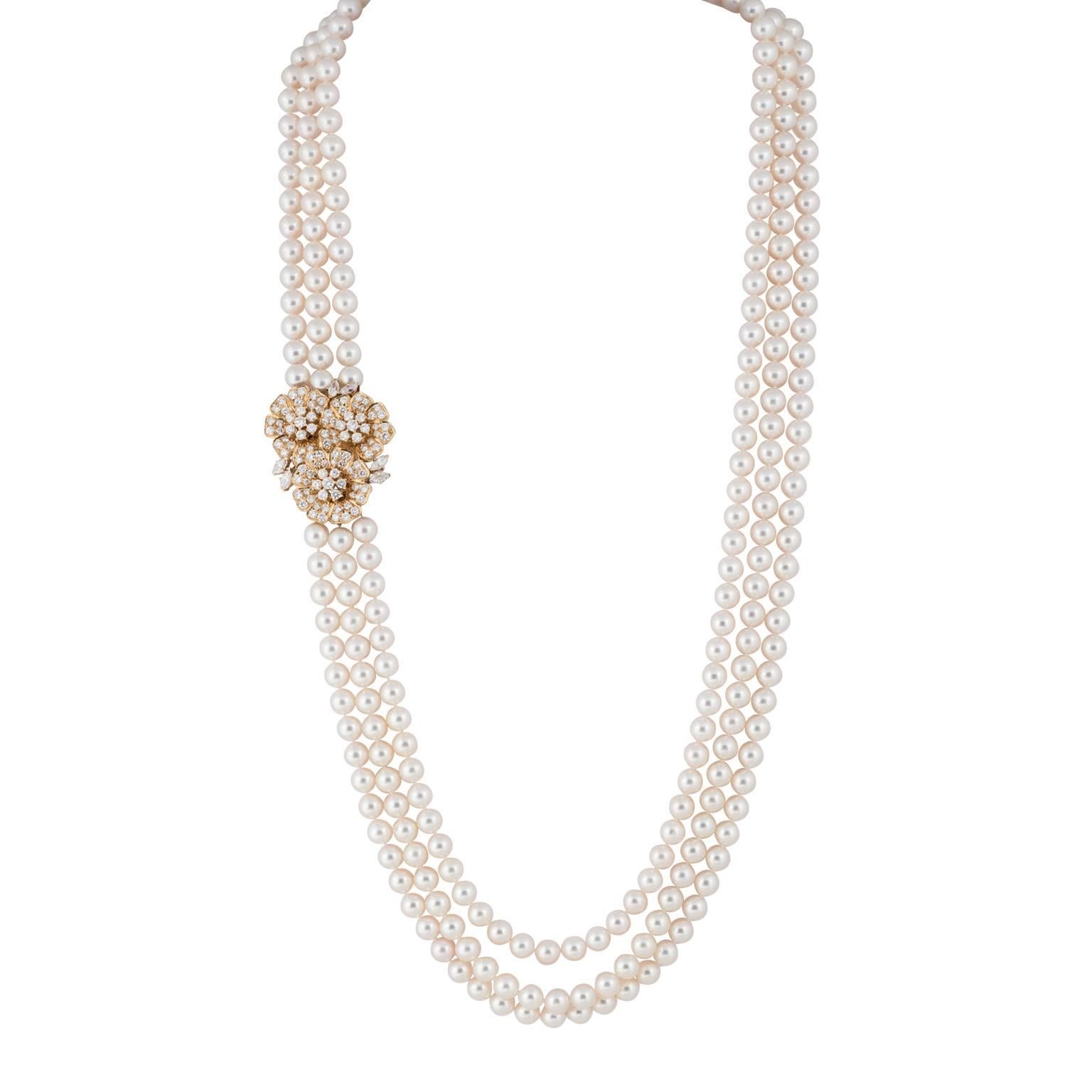 Mikimoto Three-Strand Nesting Pearls with a Diamond Yellow Gold Clasp