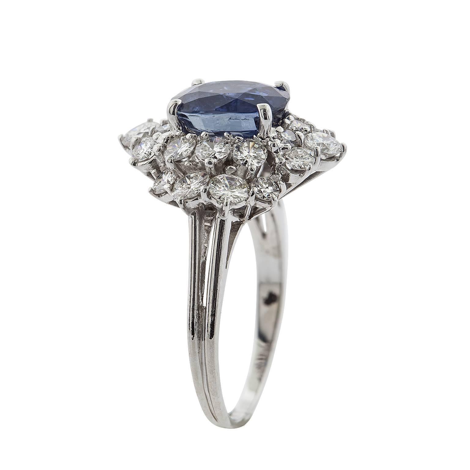 Modern 3.12 Carat Oval Sapphire and Diamond White Gold Ring