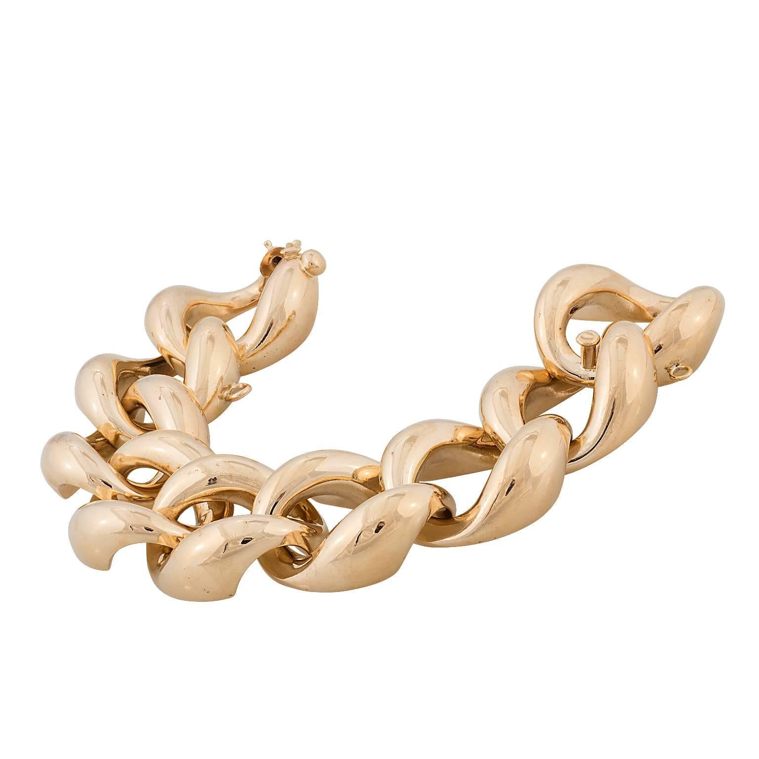 Tiffany & Co. 14 karat yellow gold large link bracelet.  The bracelet is made up of solid interlocking links, weighing 113 grams.  signed Tiffany & co.

Hallmark:  14K