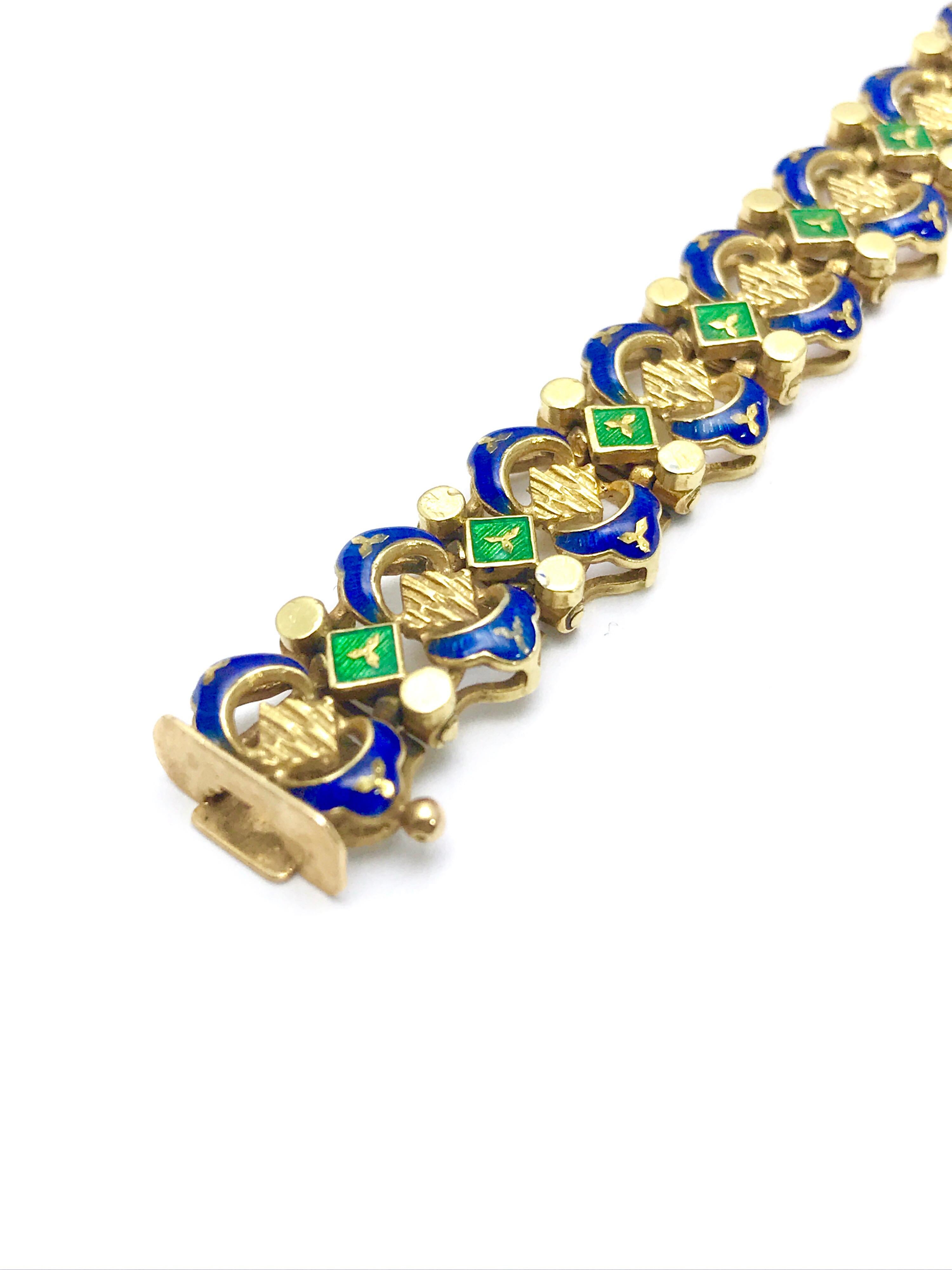 This is a beautiful Retro royal blue and shamrock green enamel and 18 karat yellow gold bracelet.  The enamel is perfectly intact and vibrant.  This is a great bracelet, easily worn all the time.  The bracelet is 7.50 inches in length.  The clasp is