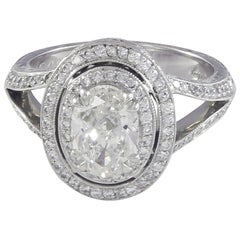 1.20 Carat G/SI1 Oval Diamond Double Halo Platinum Ring