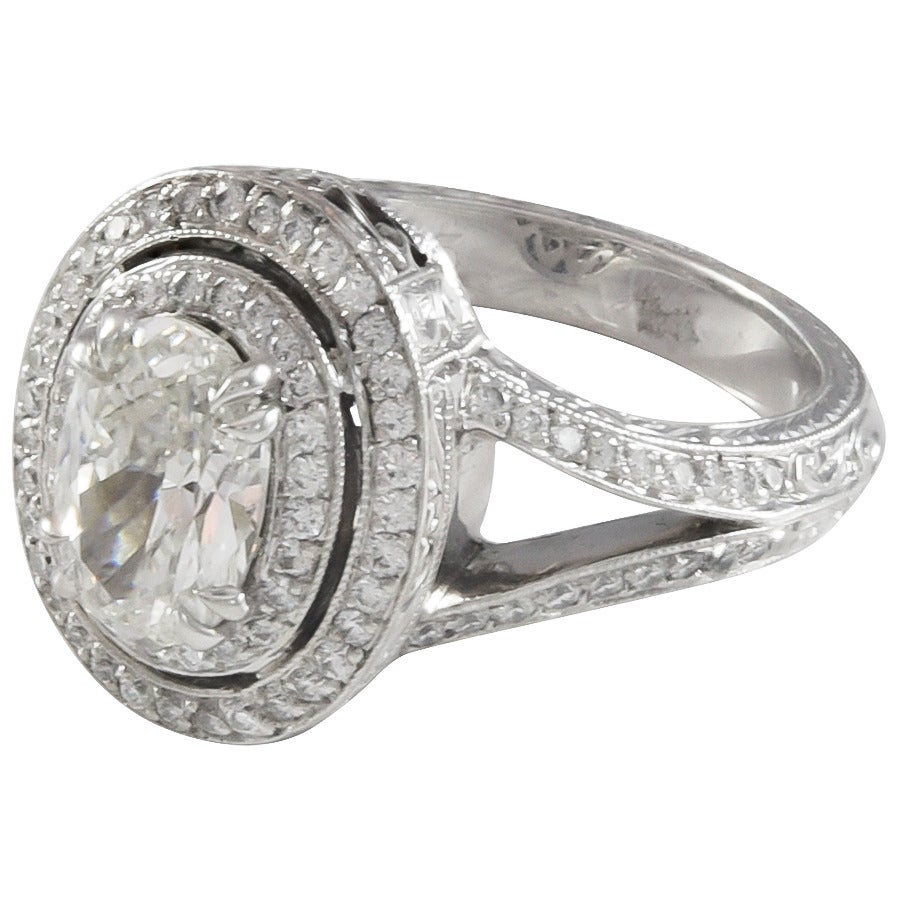 1.20 Carat G/SI1 Oval Diamond Double Halo Platinum Ring