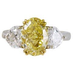 4.36 Carat GIA Cert Fancy Yellow Oval Diamond Platinum Ring