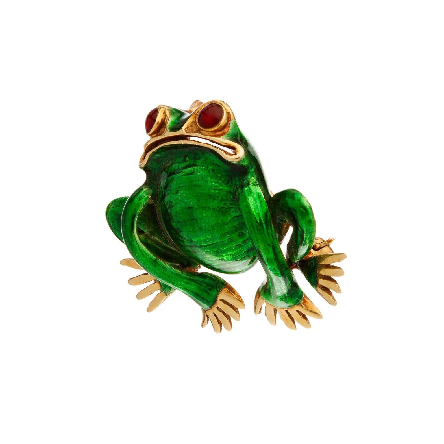 A wonderful green enamel frog with cabochon ruby eyes brooch.  The enamel is atop 18k yellow gold. 

Measurement 1.00 x 1.30 in.
Hallmark:  18K