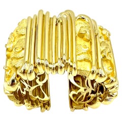 Henry Dunay Brazalete de oro amarillo macizo de 18 quilates con diseño abstracto