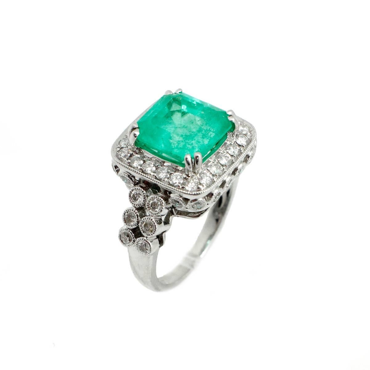4.13 Carat Natural Emerald 1.50 Carats Diamonds 18kt White Gold Statement Ring In Excellent Condition For Sale In Scottsdale, AZ