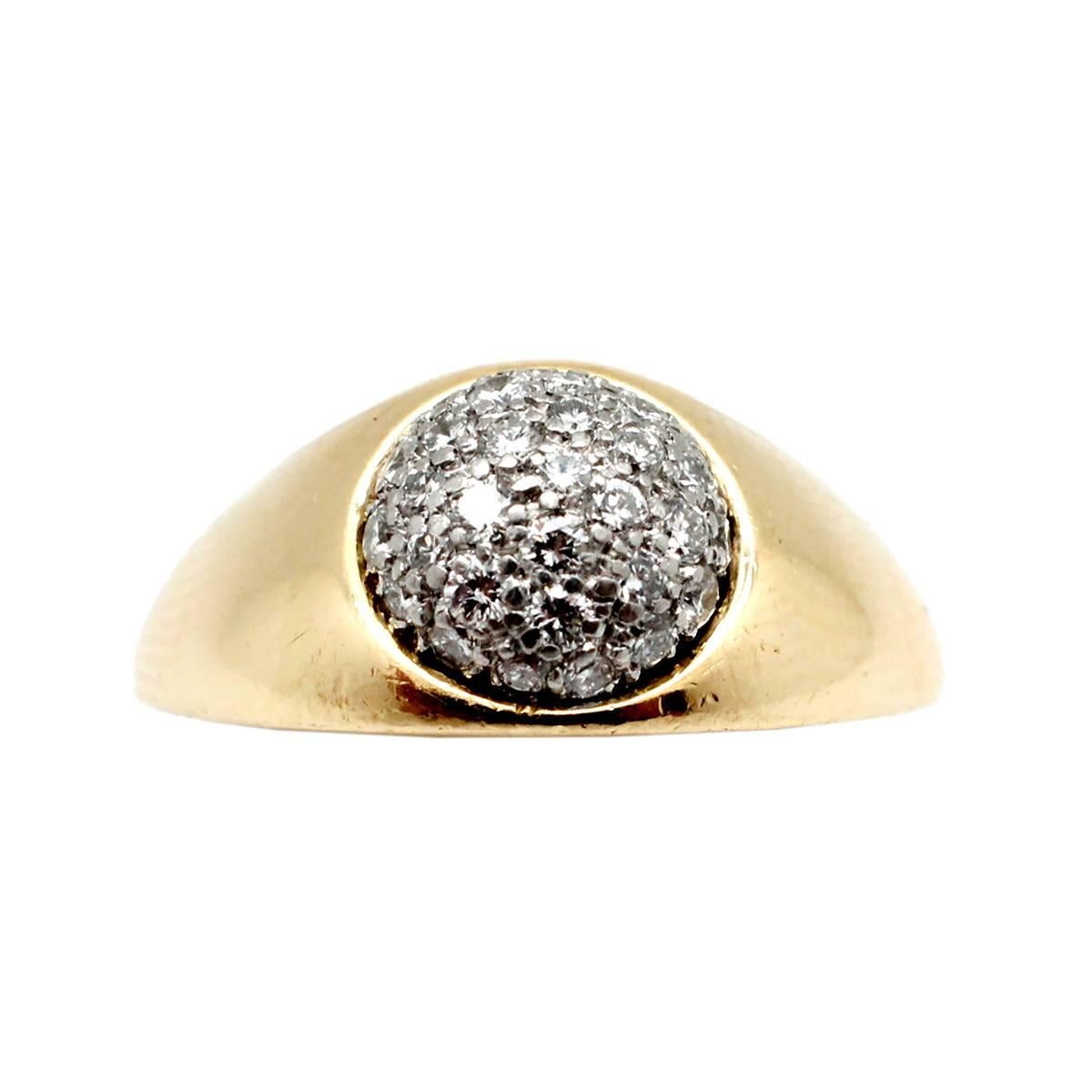 An exuberant Paloma Picasso piece, this vintage Tiffany & Co. ring from 1980 is exquisite. The 18k yellow gold and platinum exterior is designed with a diamond pave ball featuring 24 diamonds. This spherical design is crafted in 18k yellow gold and