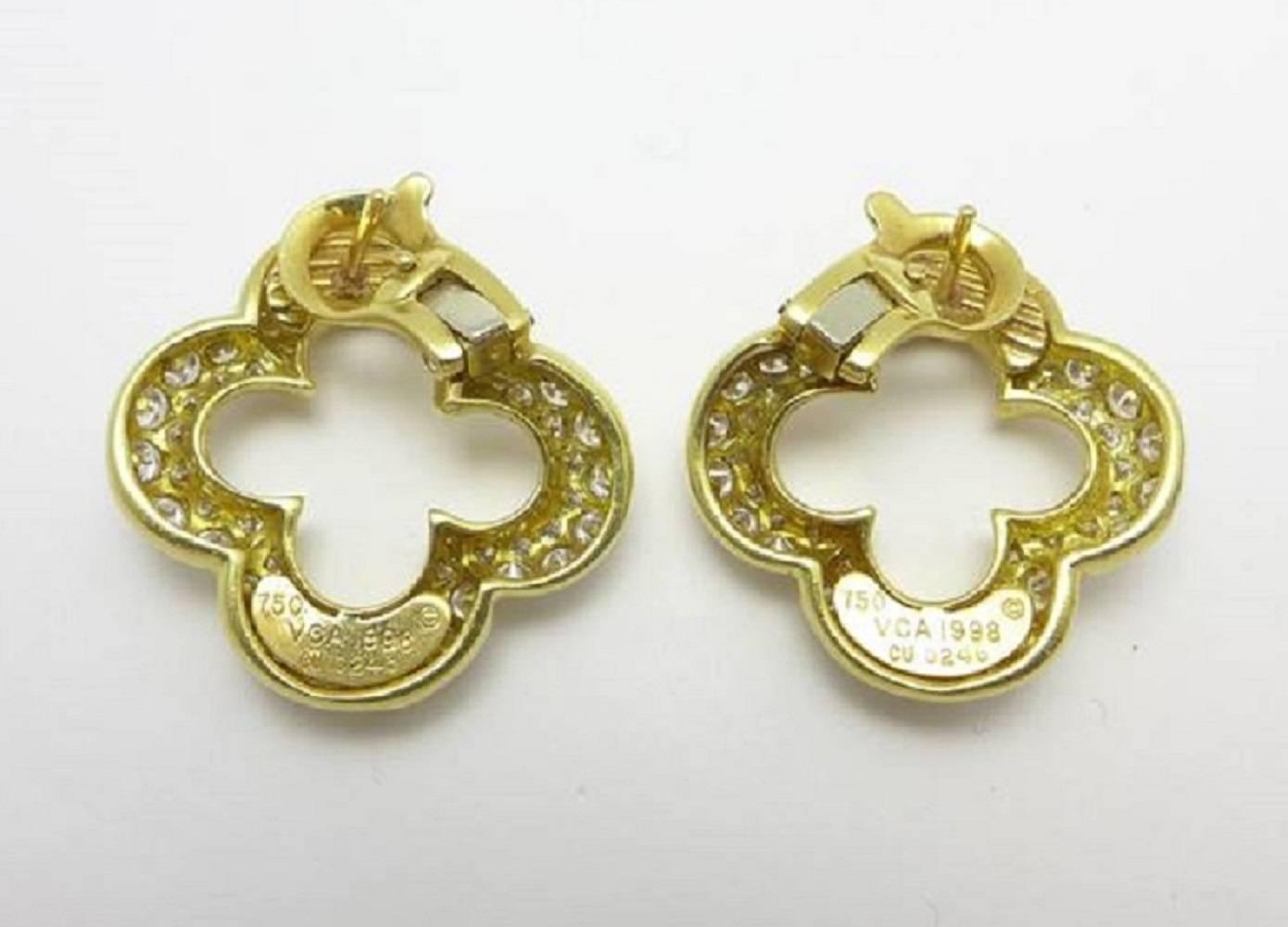 18kt  Vintage Van Cleef & Arpels Alhambra clover-shaped clip on earrings, with pavé-set round diamonds weighing approximately 3.00 total carats in VVS clarity and F color, mounted in 18k yellow gold with a perfected clover frame. Featuring clip