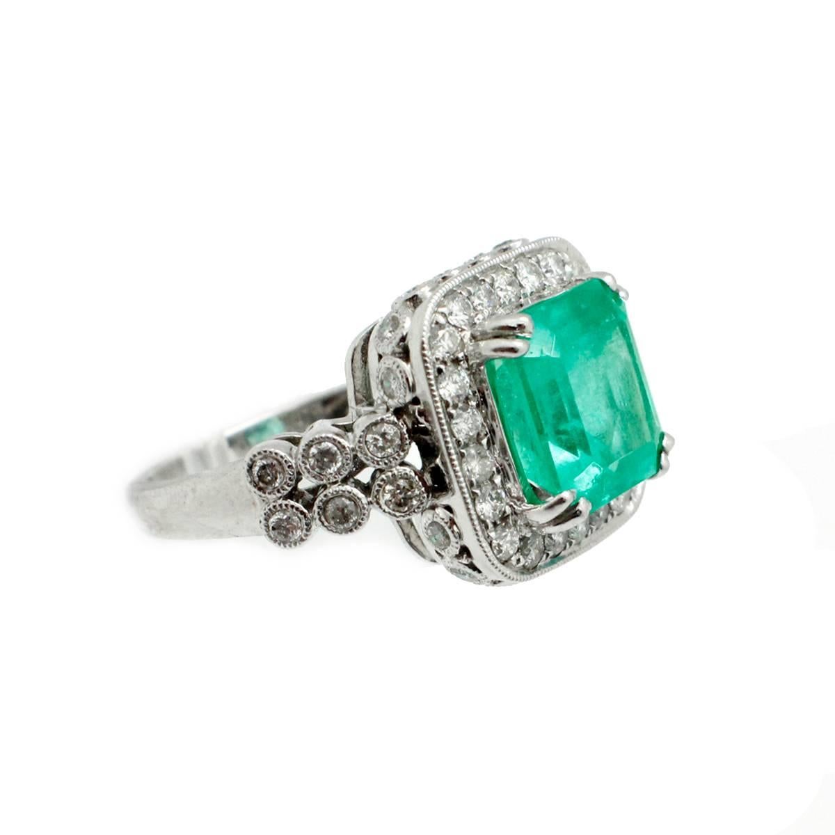 Women's 4.13 Carat Natural Emerald 1.50 Carats Diamonds 18kt White Gold Statement Ring For Sale