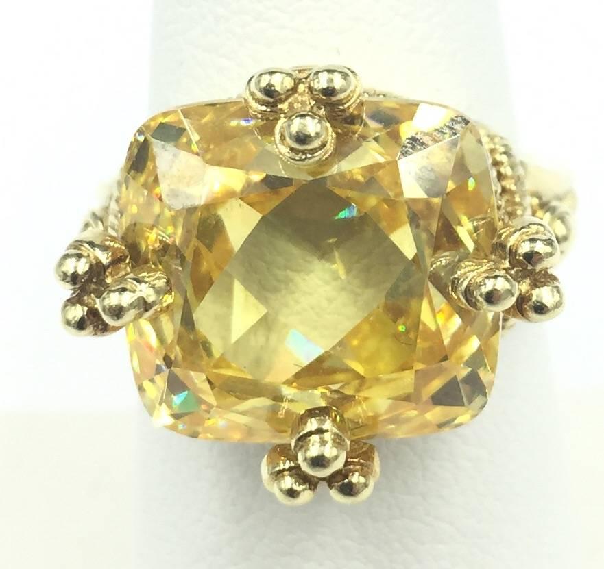 This Stunning 14kt Yellow Gold Signed by Famous Designer Judith Ripka 7 Carat Lemon Quartz Cocktail Ring is sure to astonish and amaze any onlooker. This ring has the look of royalty exhibiting fire and life at every angle.

Lemon quartz is said