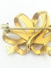 Tiffany & Co. Charming Gold Bow Brooch and Pendant with Bail