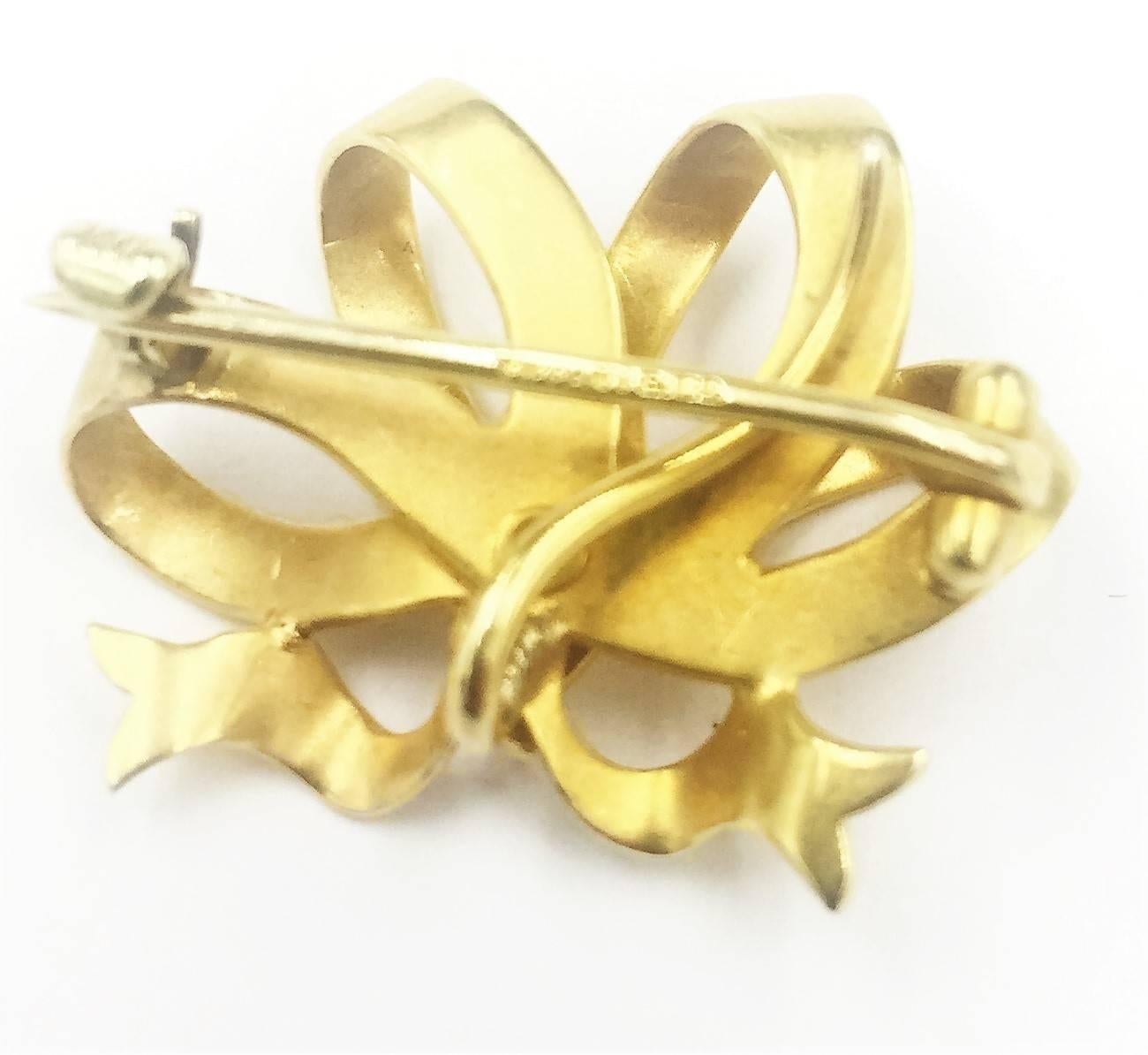 Contemporary Tiffany & Co. Charming Gold Bow Brooch and Pendant with Bail For Sale